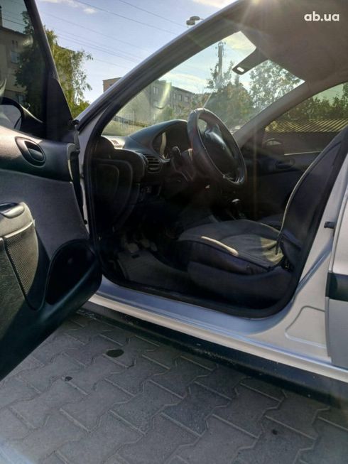 Peugeot 206 2007 серебристый - фото 7