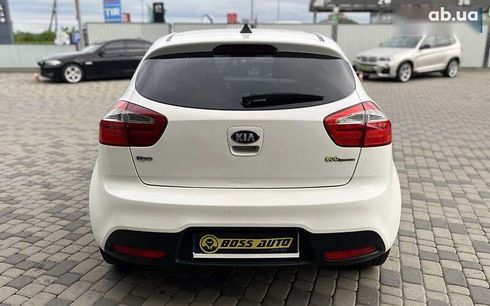Kia Rio 2013 - фото 6