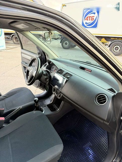 Suzuki Swift 2010 - фото 18