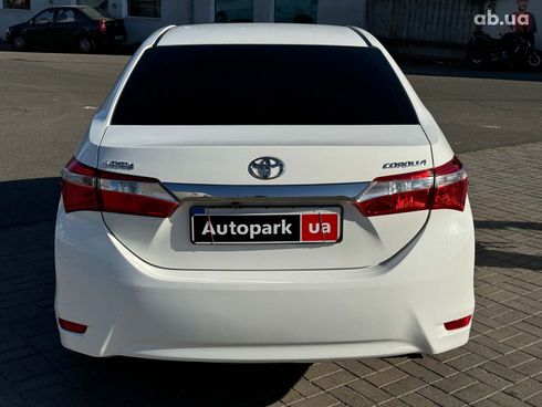 Toyota Corolla 2015 белый - фото 5