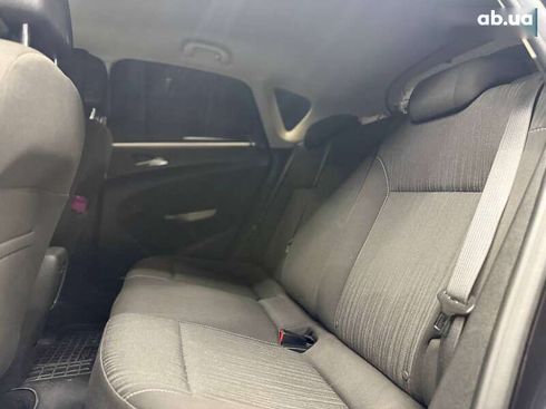 Opel Astra 2010 - фото 13