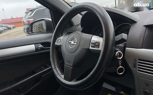 Opel Astra 2009 - фото 14