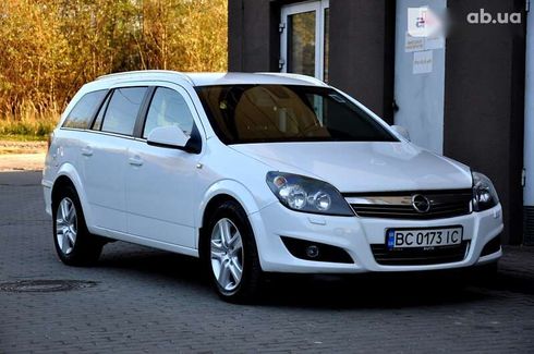 Opel Astra 2010 - фото 15