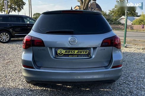 Opel Astra 2011 - фото 5