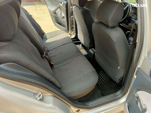 Skoda Octavia 2010 серебристый - фото 6