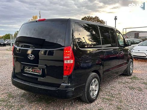 Hyundai H-1 2012 - фото 6