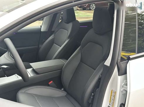 Tesla Model Y 2025 - фото 12
