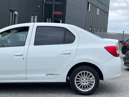 Dacia Logan 2015 белый - фото 36
