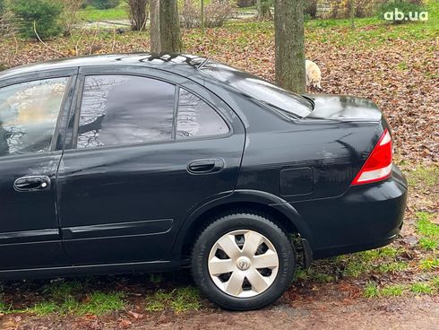 Nissan Almera 2008 черный - фото 20