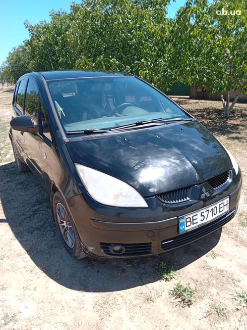 Mitsubishi Colt 2007 черный - фото 9