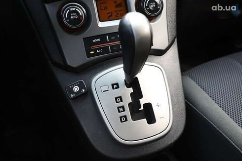 Kia Carens 2009 - фото 18