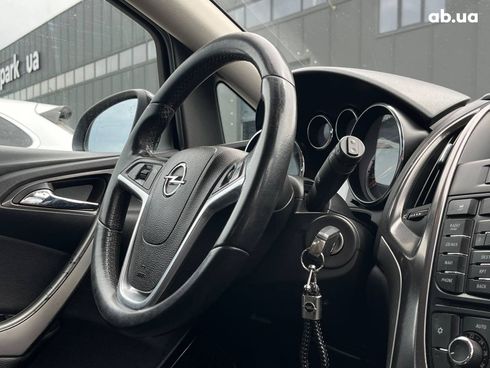 Opel Astra 2011 черный - фото 6