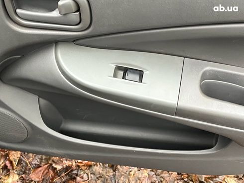 Nissan Almera 2008 черный - фото 17