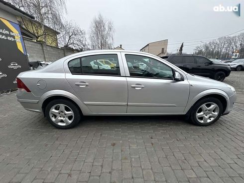 Opel Astra 2008 - фото 15