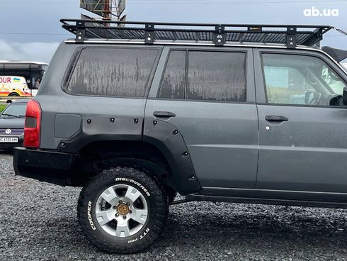 Nissan Patrol 2009 серый - фото 39