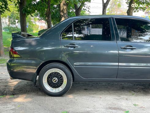Mitsubishi Lancer 2003 черный - фото 5