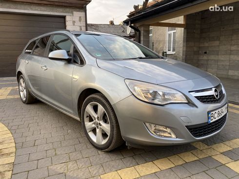 Opel Astra J 2011 серый - фото 2