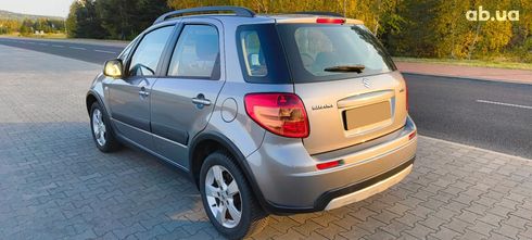 Suzuki SX4 2011 серебристый - фото 7