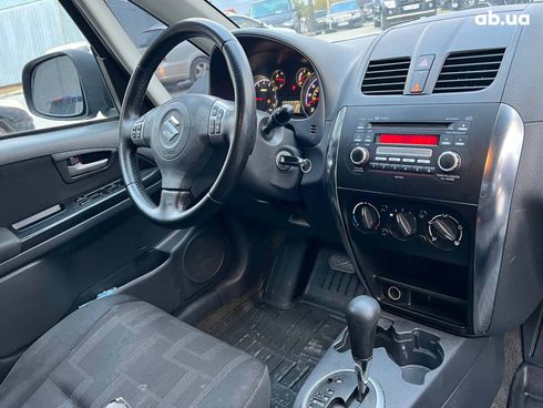 Suzuki SX4 2010 красный - фото 31