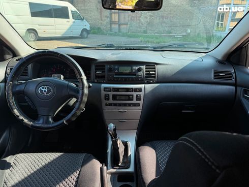 Toyota Corolla 2003 серый - фото 33