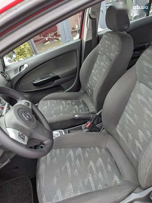 Opel Corsa 2012 - фото 11