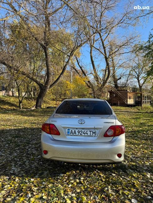 Toyota Corolla 2006 серый - фото 7