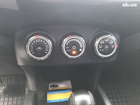 Mitsubishi Outlander 2010 черный - фото 6