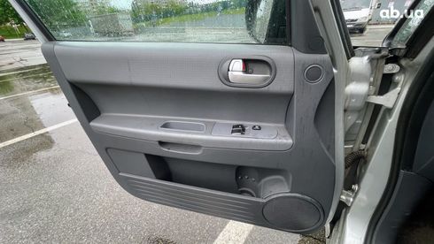 Mitsubishi Colt 2006 серебристый - фото 2