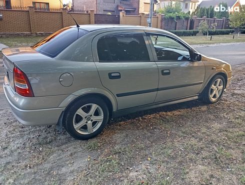 Opel Astra G 2008 серебристый - фото 11