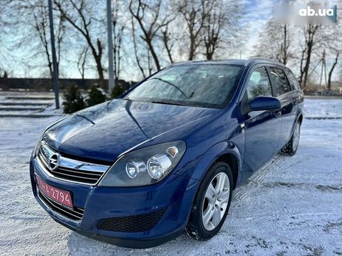 Opel Astra 2010 - фото 16