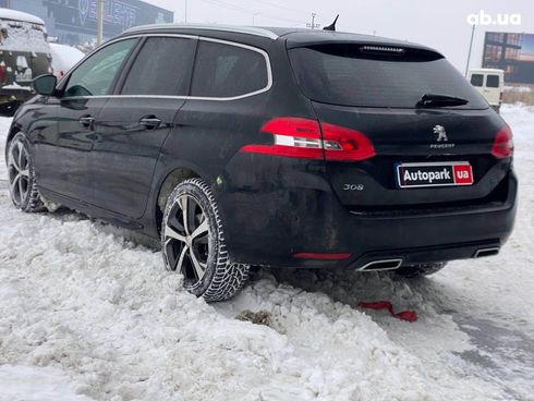 Peugeot 308 2015 черный - фото 7
