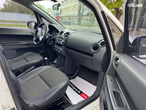 Mitsubishi Colt 2010 белый - фото 12