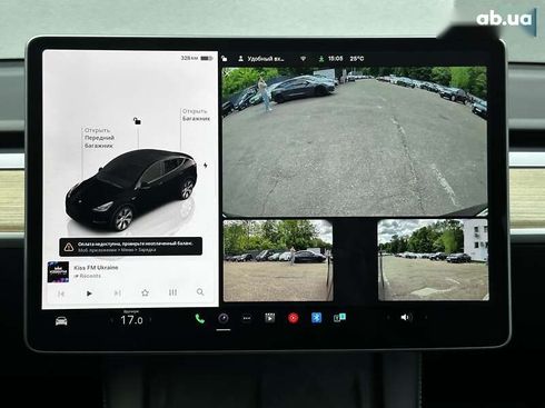 Tesla Model Y 2024 - фото 23