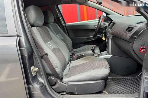 Opel Astra 2010 - фото 12