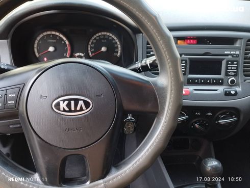 Kia Rio 2011 белый - фото 8