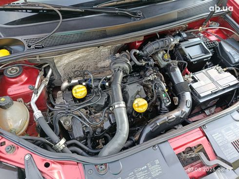 Renault Logan MCV 2013 вишневый - фото 14