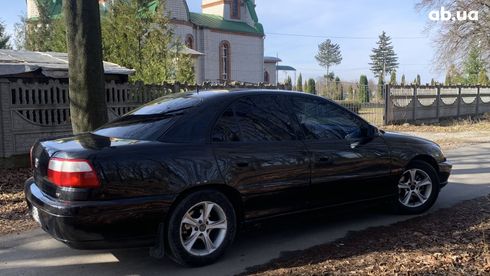 Opel Omega 2001 черный - фото 7