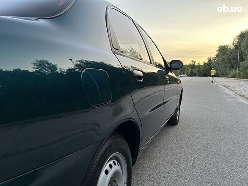 Daewoo Sens 2005 золотистый - фото 4