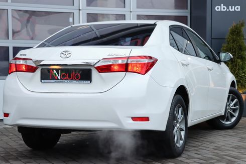 Toyota Corolla 2015 белый - фото 3