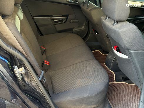 Opel Astra 2009 черный - фото 23