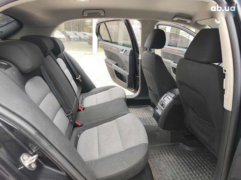 Skoda Superb 2011 - фото 10