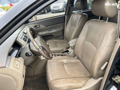 Chery Elara 2008 черный - фото 16