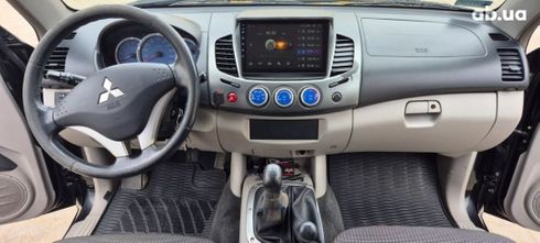 Mitsubishi L200 2007 черный - фото 6