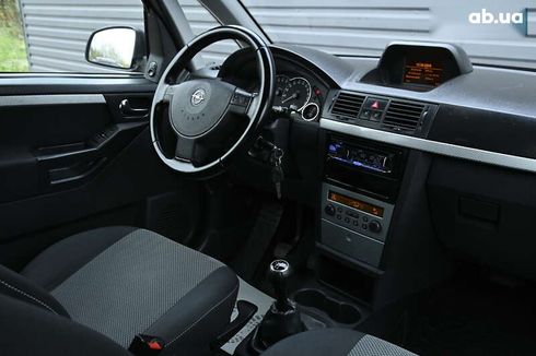 Opel Meriva 2009 - фото 27