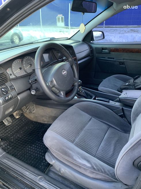 Opel Omega 2001 черный - фото 15
