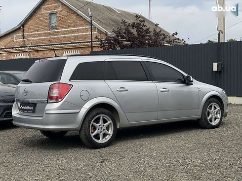 Opel Astra 2010 - фото 21