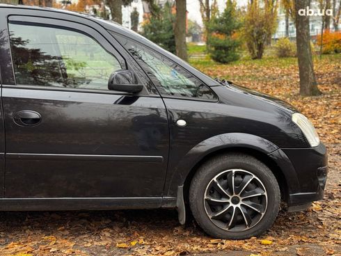 Opel Meriva 2006 черный - фото 6