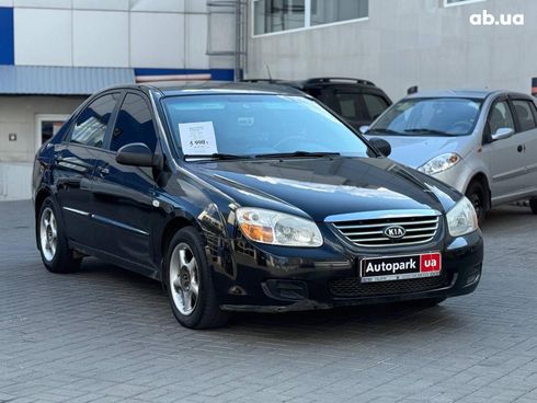 Kia Cerato 2008 черный - фото 9