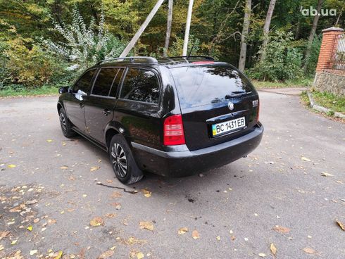 Skoda Octavia 2008 черный - фото 6