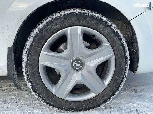 Opel Zafira 2012 - фото 18